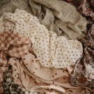 Swaddle, black daisy, Mushie thumbnail